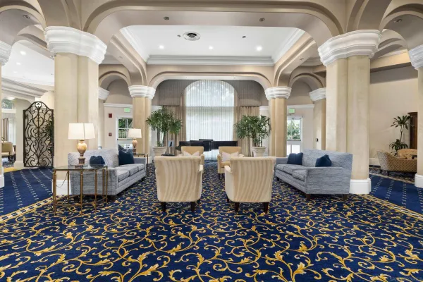 an outdoor space with patio and white umbrellas