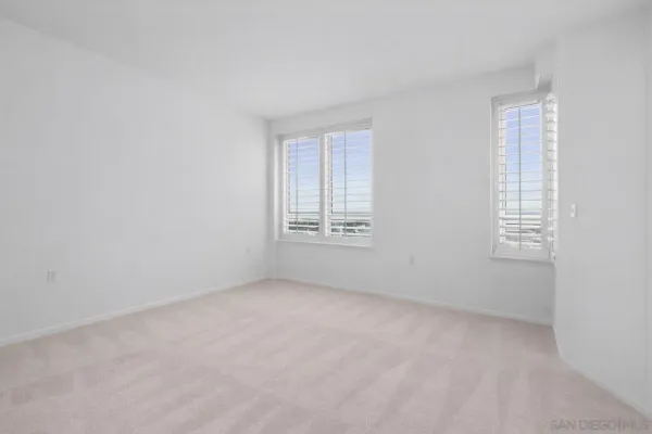 an empty room with a bathroom