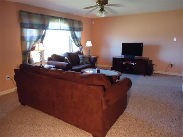 361 Hadley Road Sunderland, MA 01375 - Photo 11 of 22 a living room with furniture and a flat screen tv