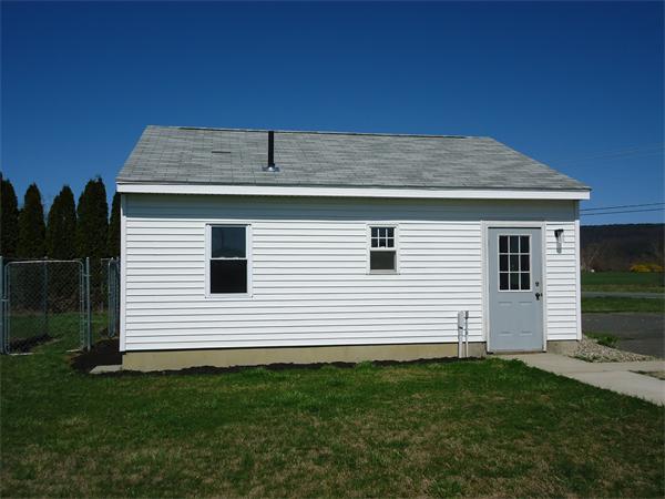 361 Hadley Road Sunderland, MA 01375 - Photo 3 of 22 a view of a house with a backyard