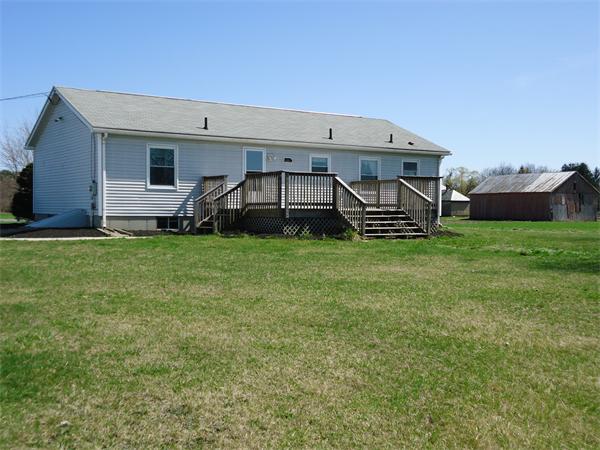 361 Hadley Road Sunderland, MA 01375 - Photo 10 of 22 a backyard of a house with table and chairs