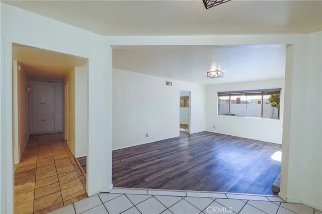 a view of an empty room and window