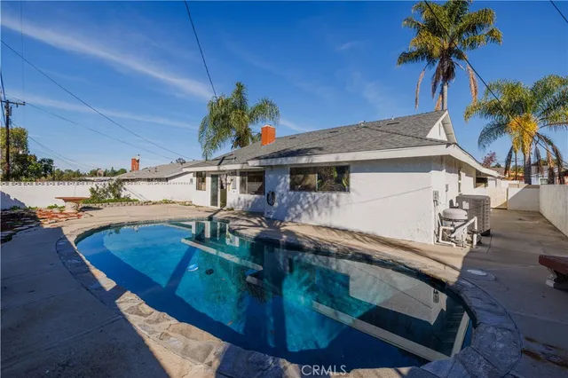 a view of a house with a swimming pool