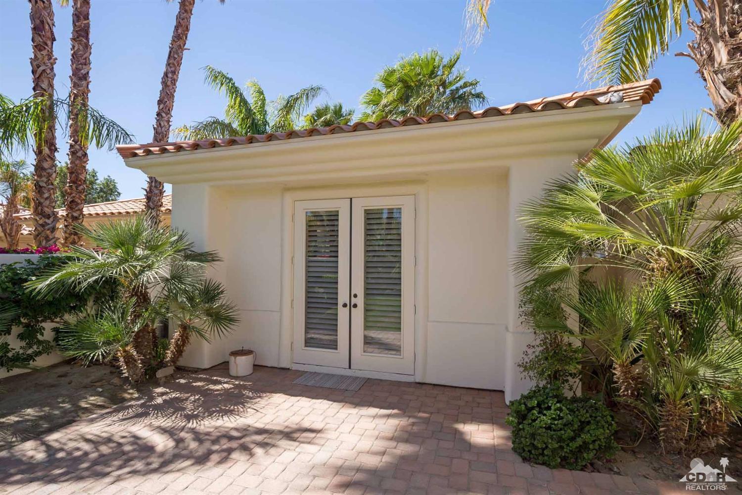 80352 Riviera La Quinta, CA 92253 - Photo 23 of 31 a view of a house with a small yard and plants