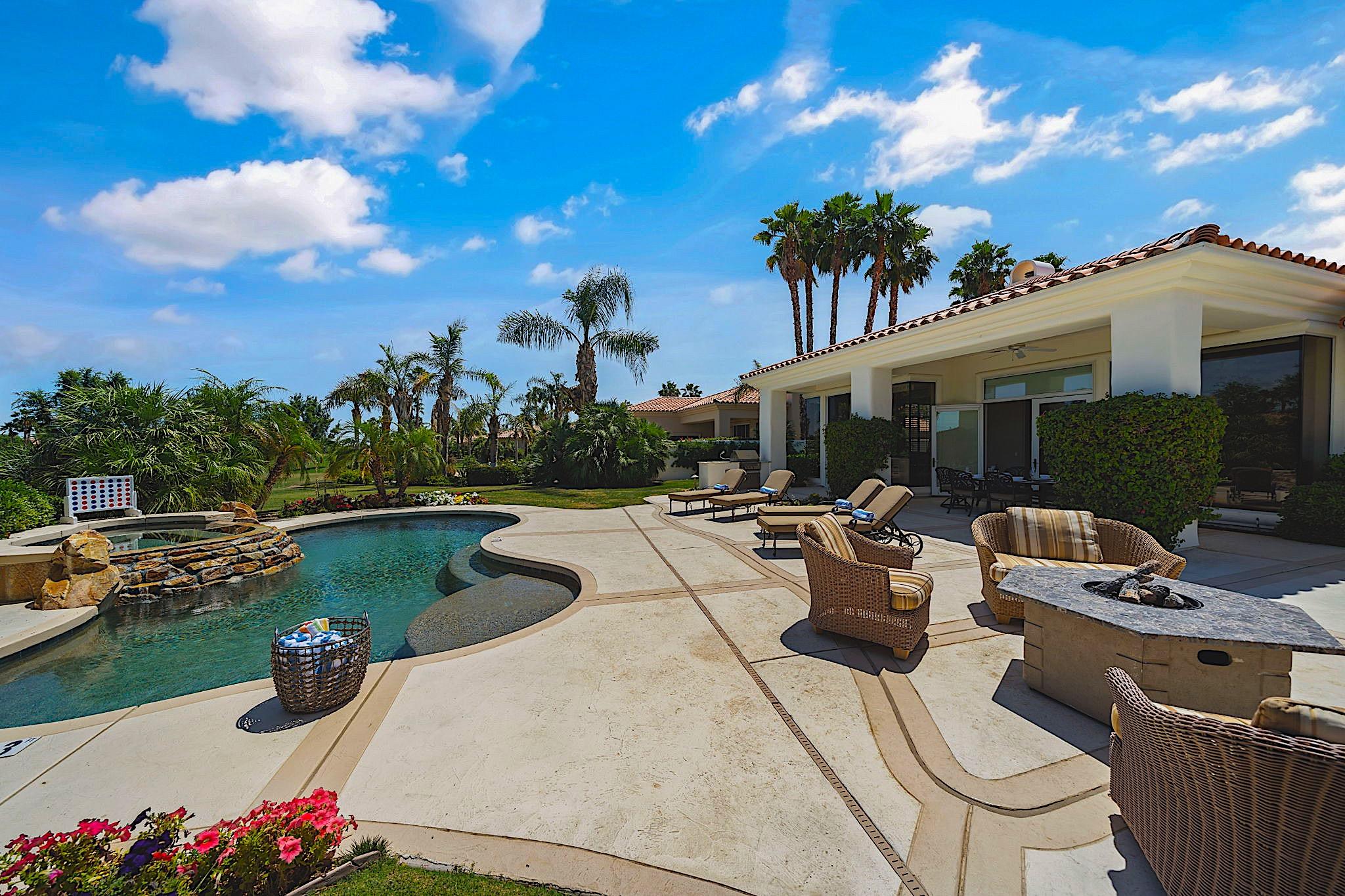 80352 Riviera La Quinta, CA 92253 - Photo 26 of 31 a view of a patio with couches table and chairs and potted plants