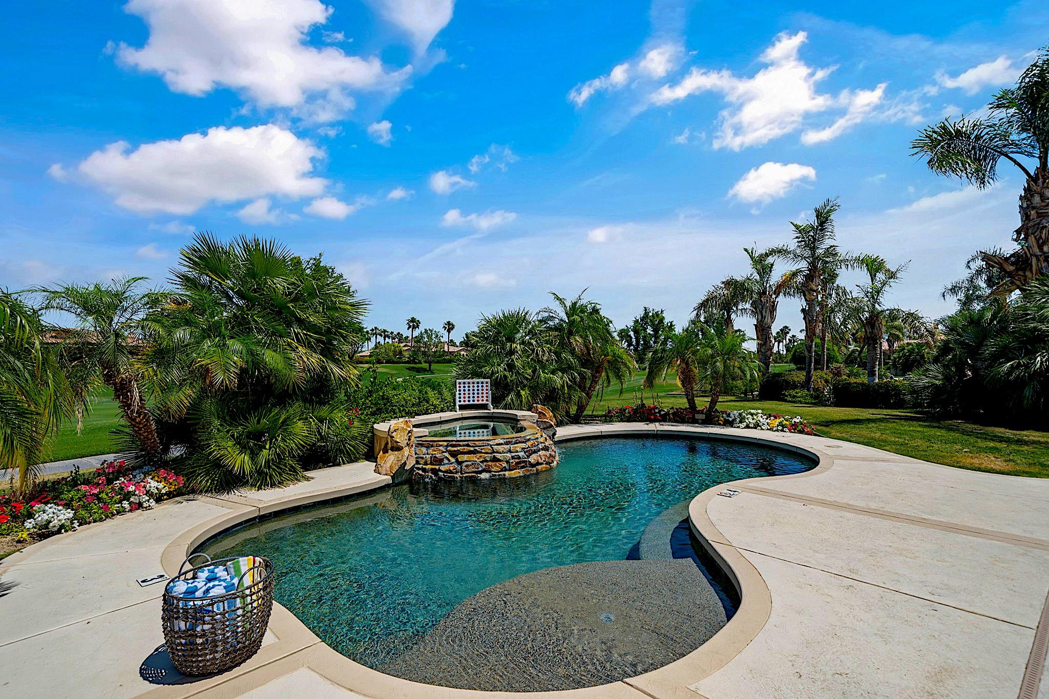 80352 Riviera La Quinta, CA 92253 - Photo 30 of 31 a house view with swimming pool and garden space