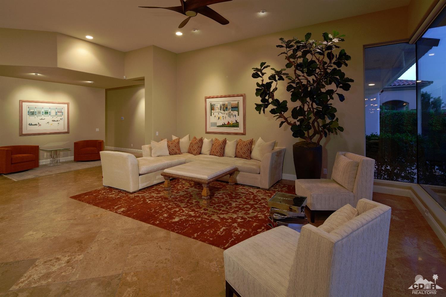 80352 Riviera La Quinta, CA 92253 - Photo 7 of 31 a living room with furniture potted plant and a window