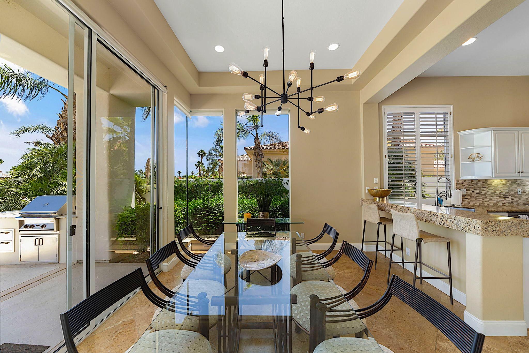 80352 Riviera La Quinta, CA 92253 - Photo 9 of 31 a view of a dining room with furniture window and outside view