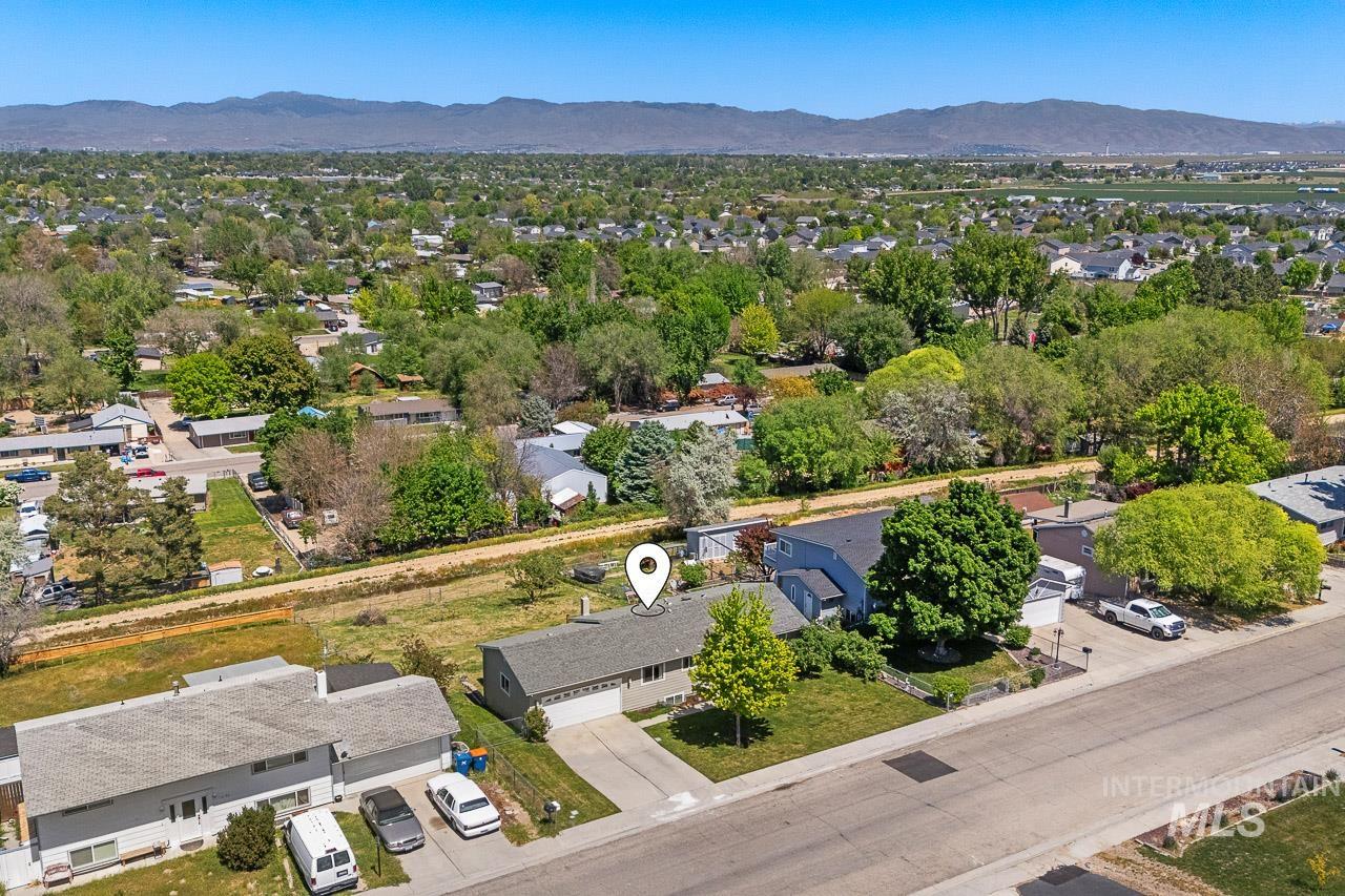 10178 West Fox Ridge Drive Boise, ID 83709 - Photo 36 of 36 Aerial perspective showcasing the residential neighborhood with distant mountains
