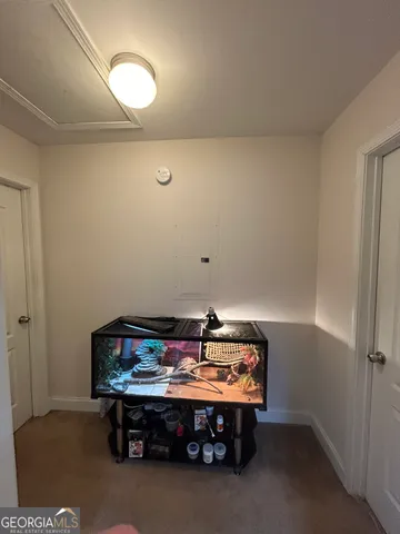 a room with furniture and wooden floor