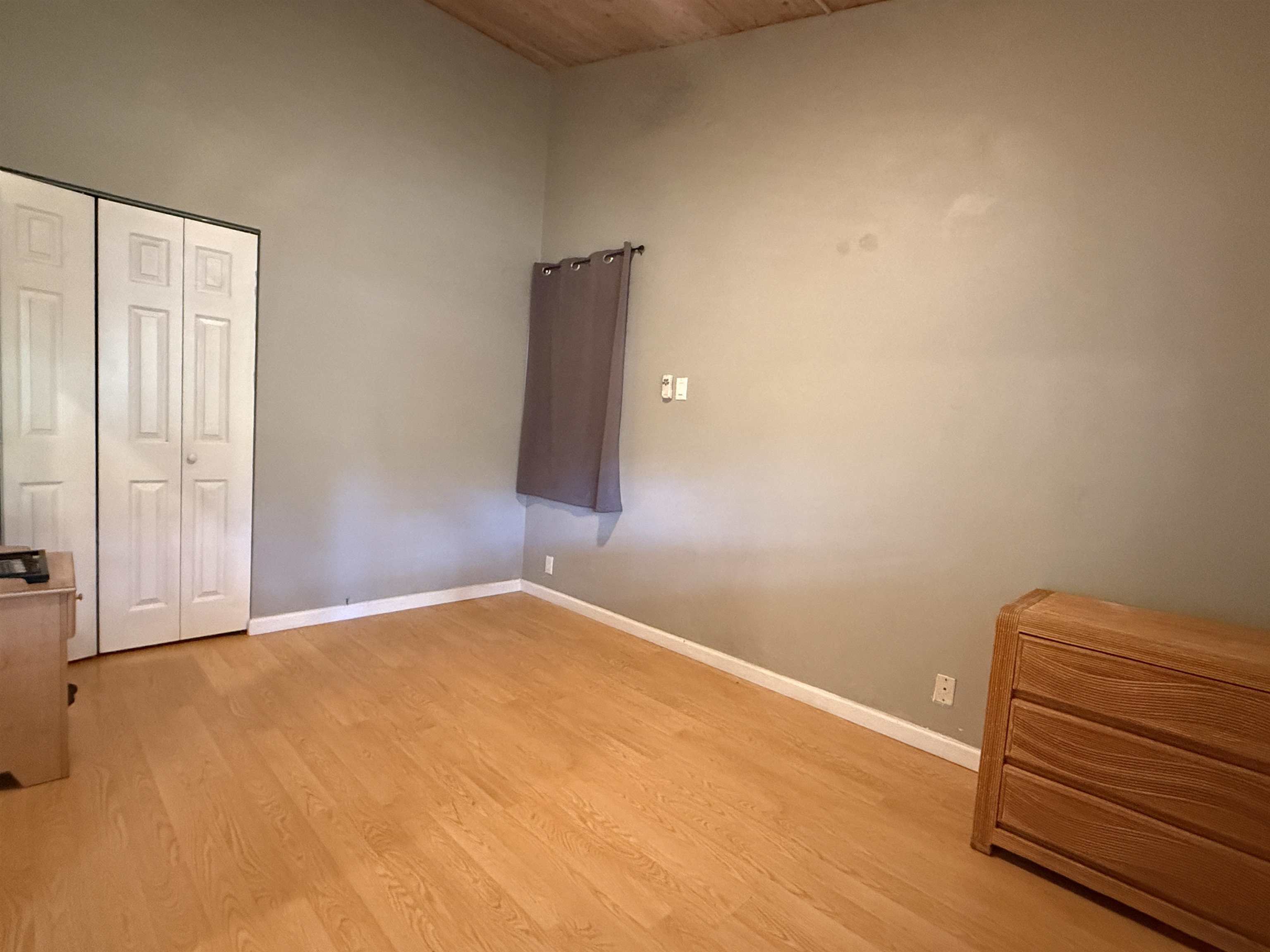 4435 Lower Honoapiilani Road, Unit 235 Lahaina, HI 96761 - Photo 11 of 21 a view of a room with wooden floor and windows