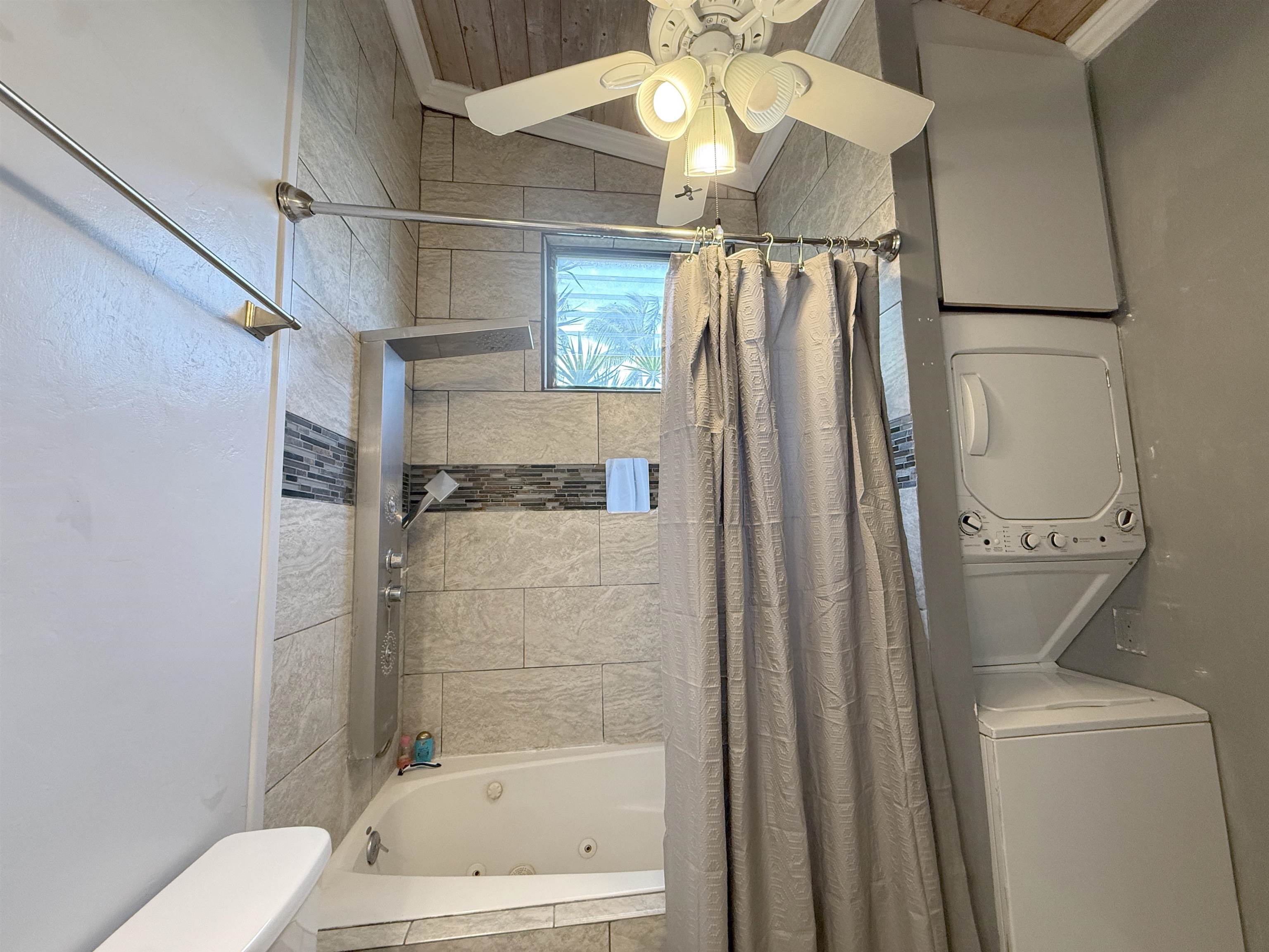 4435 Lower Honoapiilani Road, Unit 235 Lahaina, HI 96761 - Photo 15 of 21 a bathroom with a shower a toilet and a shower