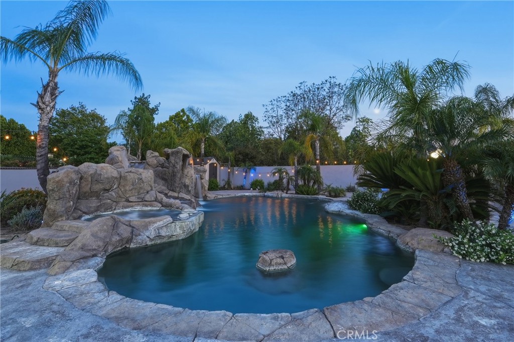 7252 Boice Lane Riverside, CA 92506 - Photo 58 of 59 Beautiful pool with slide, lined with palm trees