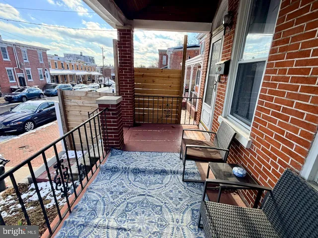 a view of chairs in the balcony
