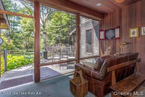 16 Sahler Mill Road Olivebridge, NY 12461 - Photo 20 of 50 a living room with furniture and a floor to ceiling window