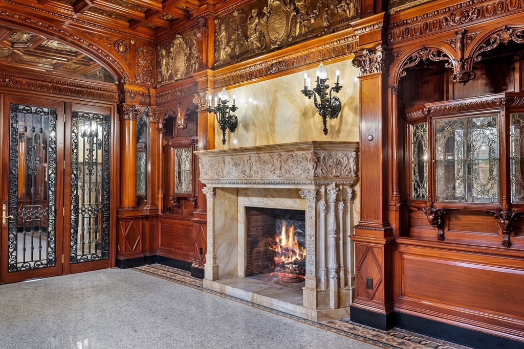 314 Commonwealth Avenue, Unit PH Boston, MA 02115 - Photo 2 of 41 a view of a livingroom with fireplace and furniture