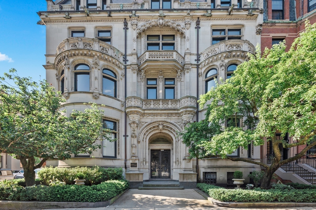 314 Commonwealth Avenue, Unit PH Boston, MA 02115 - Photo 41 of 41 a front view of a building with a garden
