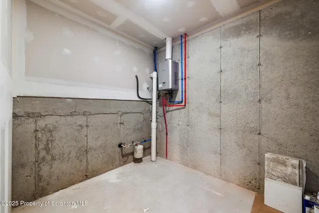 a bathroom with a sink and shower