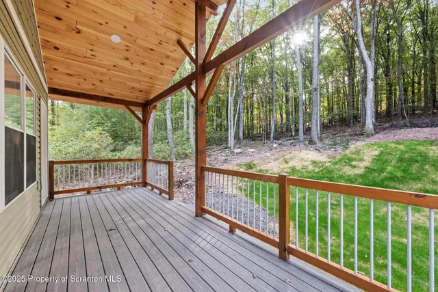 a view of backyard with green space