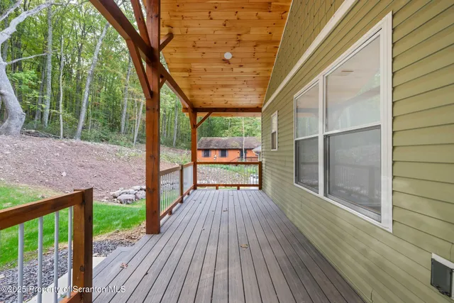 a view of backyard with green space