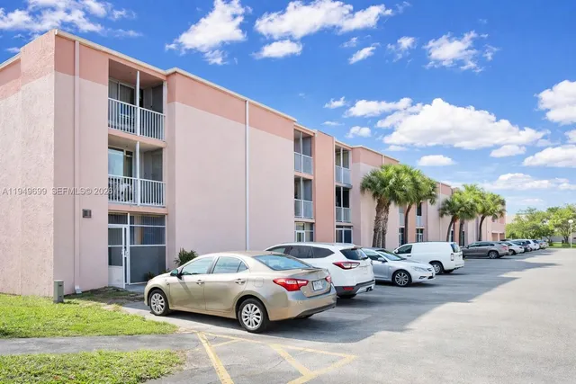 a cars parked in front of a building