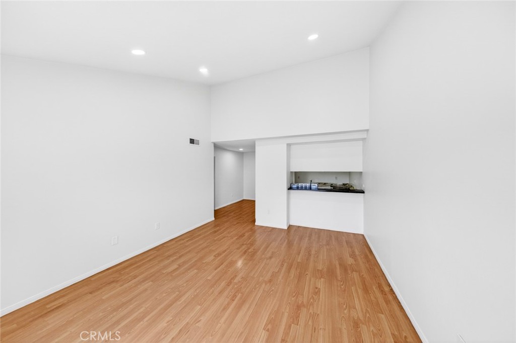 3054 Associated, Unit 26 Fullerton, CA 92835 - Photo 11 of 27 a view of a room with wooden floor
