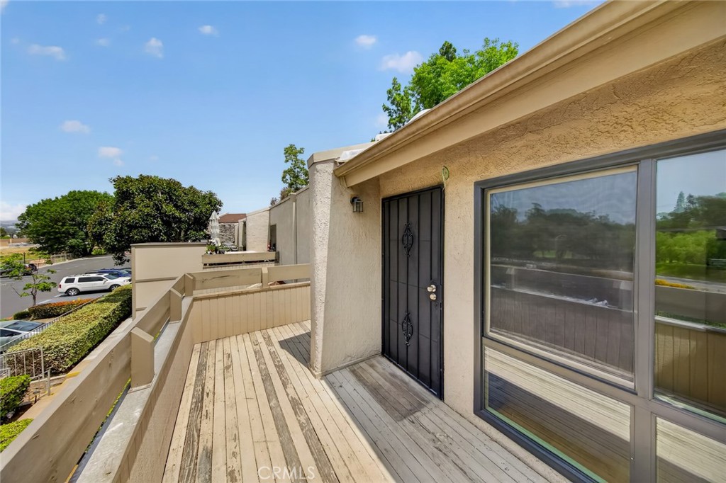 3054 Associated, Unit 26 Fullerton, CA 92835 - Photo 16 of 27 a view of balcony and deck