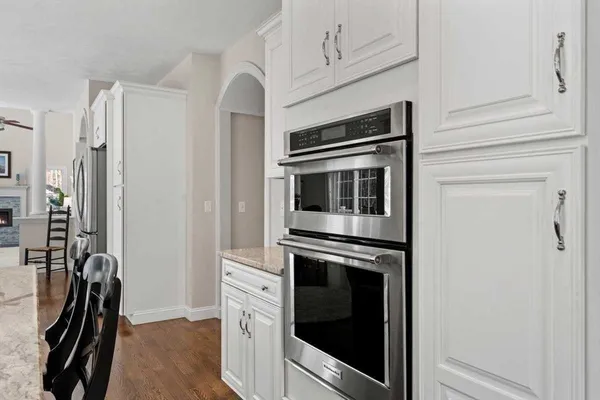 a bathroom with a double vanity sink mirror and