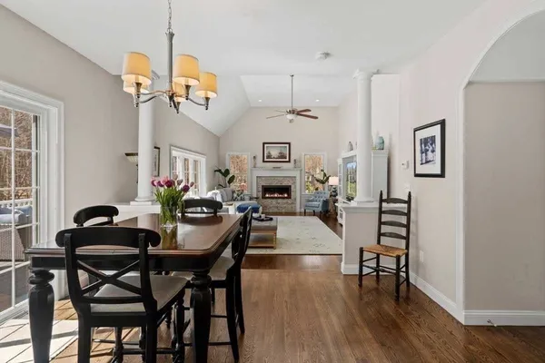 a spacious bathroom with a bathtub shower sink and mirror