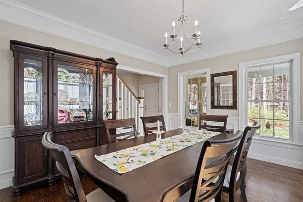 a kitchen with stainless steel appliances a stove microwave and a refrigerator