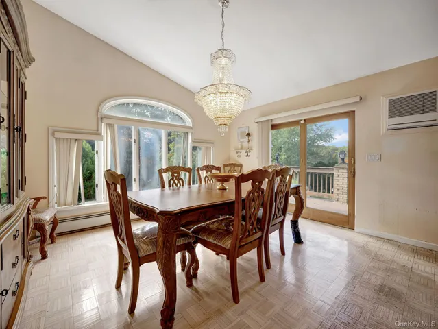 a kitchen with granite countertop a refrigerator sink and cabinets