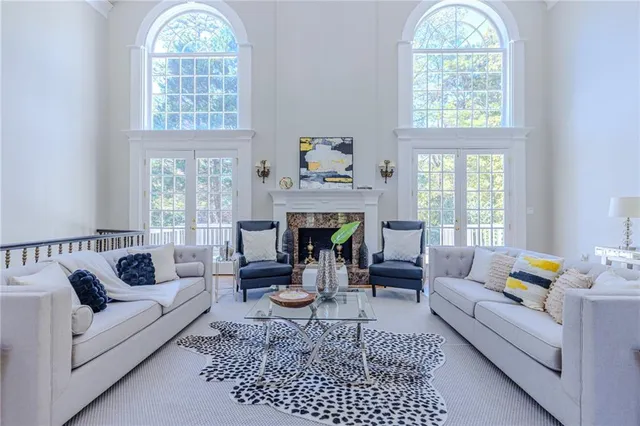 wooden floor fireplace and windows