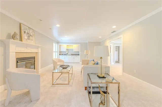 a white toilet sitting next to a white sink