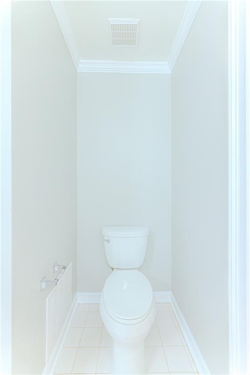 7680 Jett Ferry Road Atlanta, GA 30350 - Photo 48 of 74 a white toilet sitting next to a white sink