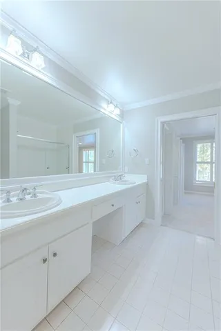 a aerial view of a house with swimming pool and wooden fence