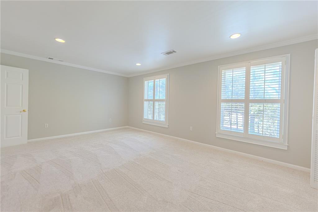 7680 Jett Ferry Road Atlanta, GA 30350 - Photo 50 of 74 an empty room with a window