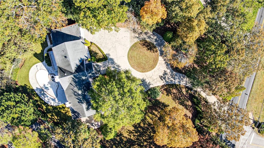 7680 Jett Ferry Road Atlanta, GA 30350 - Photo 72 of 74 a aerial view of a house with swimming pool and wooden fence