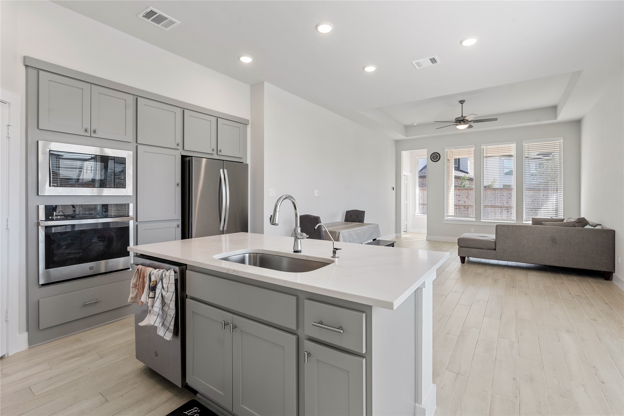17623 Azalea Clf Court Richmond, TX 77407 - Photo 12 of 33 a kitchen with stainless steel appliances granite countertop a sink and refrigerator