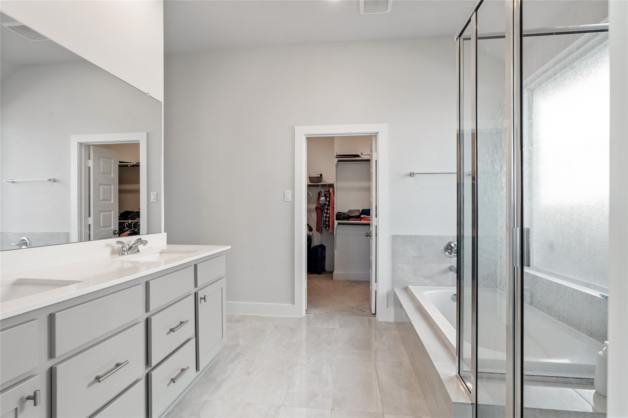 17623 Azalea Clf Court Richmond, TX 77407 - Photo 21 of 33 a bathroom with a sink and a mirror