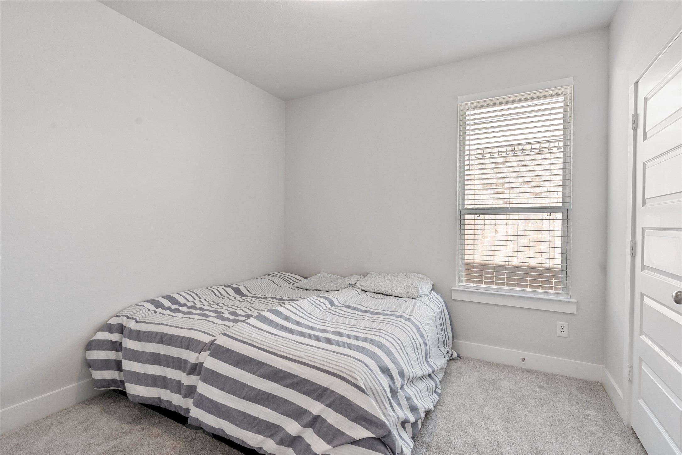 17623 Azalea Clf Court Richmond, TX 77407 - Photo 25 of 33 a view of a bedroom with a bed