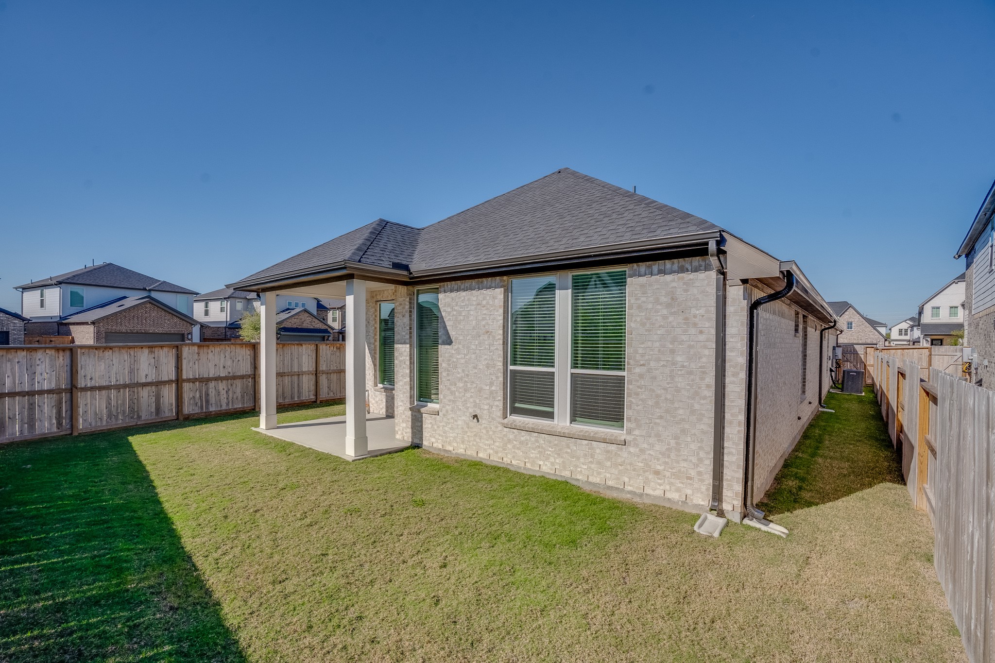 17623 Azalea Clf Court Richmond, TX 77407 - Photo 29 of 33 a view of a house with a yard and porch