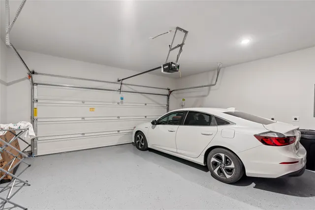 a view of a garage with a utility room