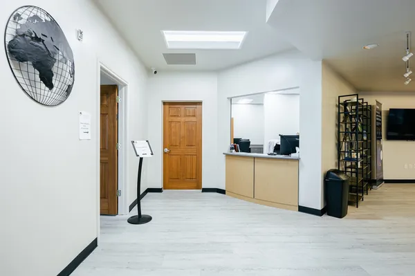 a view of a kitchen and utility room