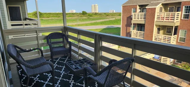 a view of a city from a balcony