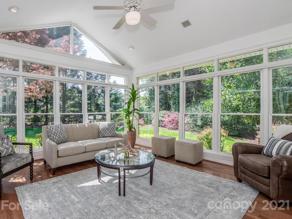4743 Binfords Ridge Road Charlotte, NC 28226 - Photo 14 of 41 a living room with furniture and a large window