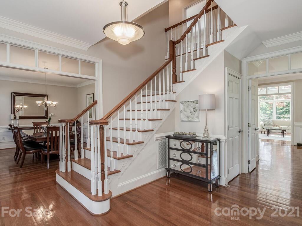 4743 Binfords Ridge Road Charlotte, NC 28226 - Photo 4 of 41 a view of entryway with wooden floor and stairs