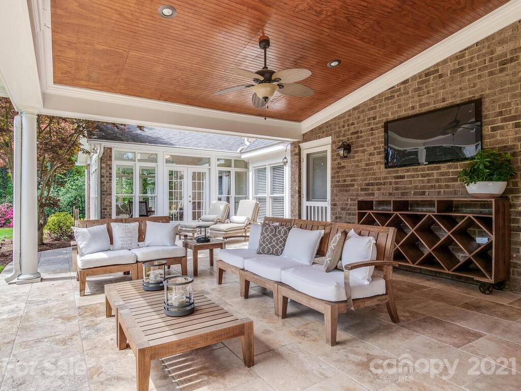 4743 Binfords Ridge Road Charlotte, NC 28226 - Photo 32 of 41 a outdoor space with patio furniture and a fireplace