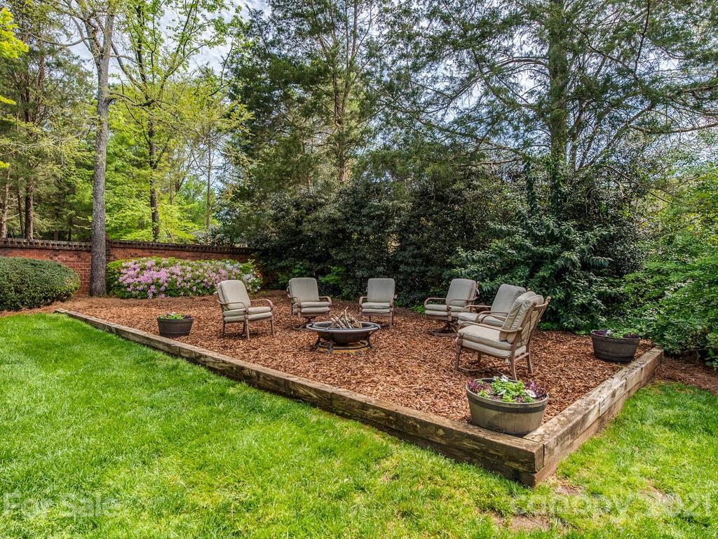 4743 Binfords Ridge Road Charlotte, NC 28226 - Photo 35 of 41 a view of a backyard with sitting area