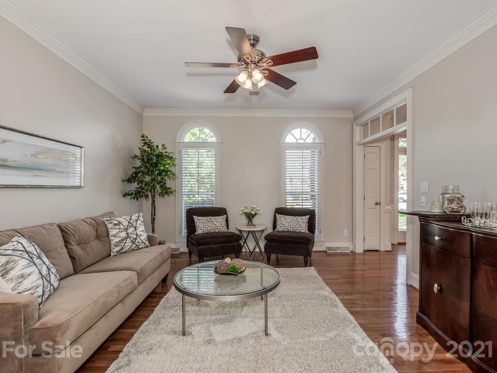 4743 Binfords Ridge Road Charlotte, NC 28226 - Photo 5 of 41 a living room with furniture and wooden floor