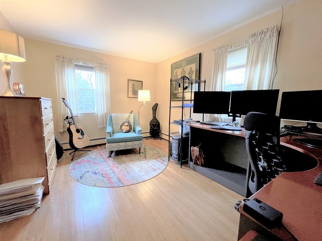 10 Phyllis Road Foxboro, MA 02035 - Photo 14 of 28 a living room with furniture a piano and a window
